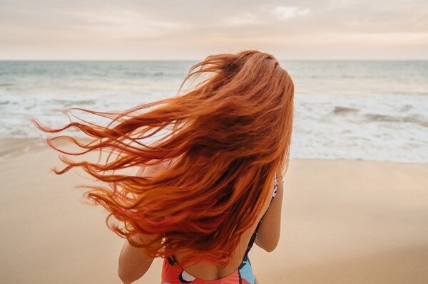Come prendersi cura dei capelli rossi  